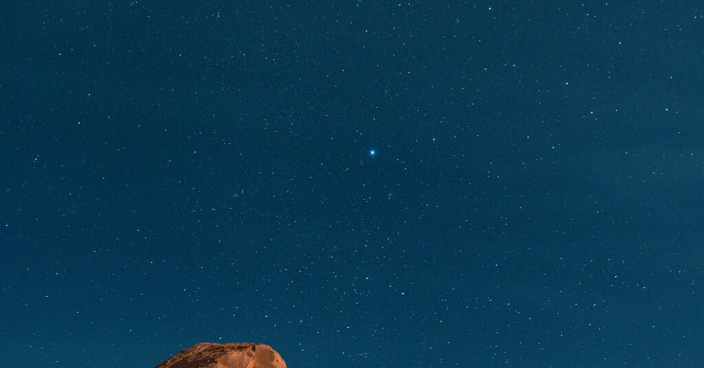 Explore the mesmerizing starry sky over desert rock formations in Siwa, Egypt.